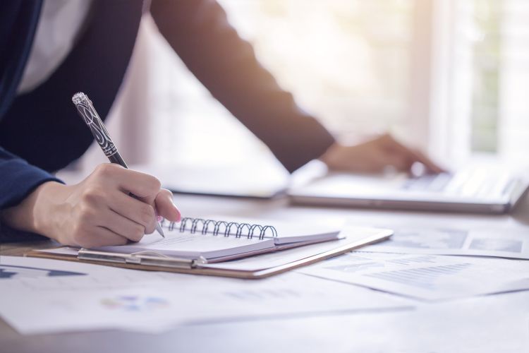 Woman working with papers.jpg