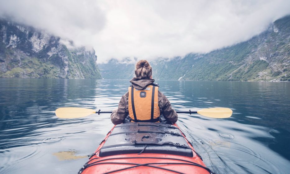 woman kayaking in norway